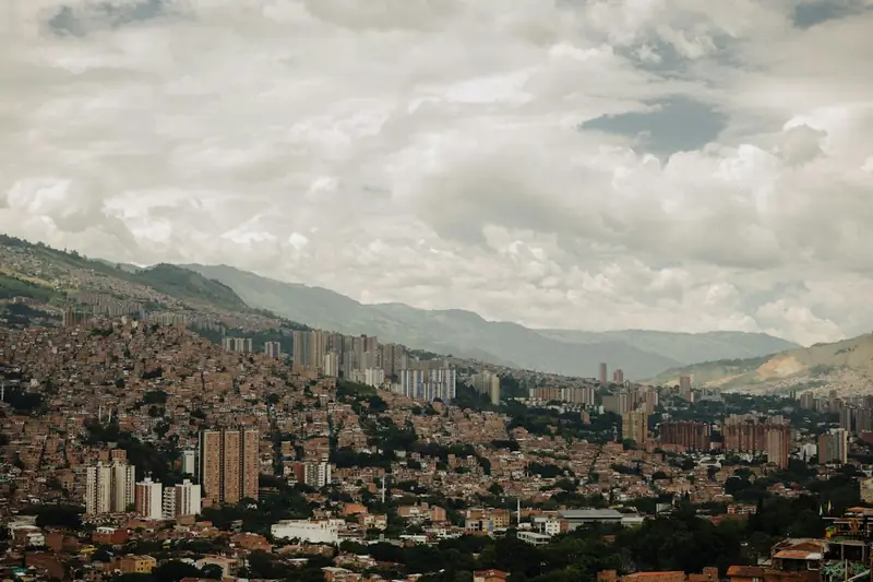 Green Medellín city view between surrounding hills